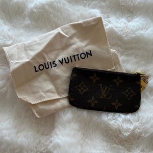 Louis Vuitton Black and Gold Monogram Wristlet